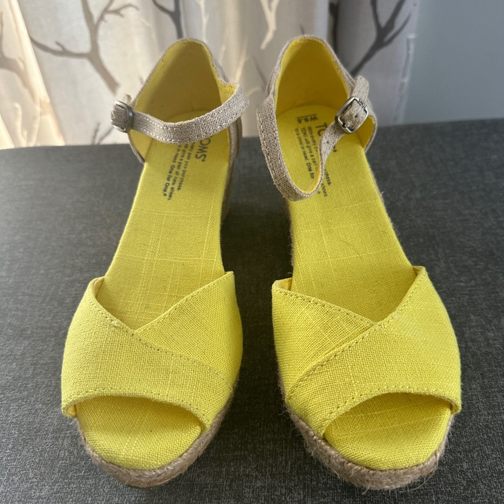 Toms bright yellow and tan wedges. Like new